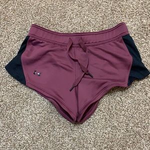 UA size S fitted, wine colored, polyester athletic shorts